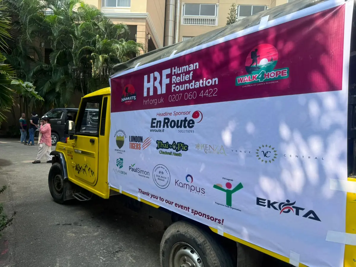 Human Relief Foundation aid vehicle carrying the Walk4Hope sponsorship banner with En Route Solutions as headline sponsor